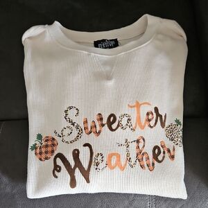 White Sweater with Orange and Brown Accents